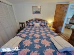 Backside bedroom with pine paneling